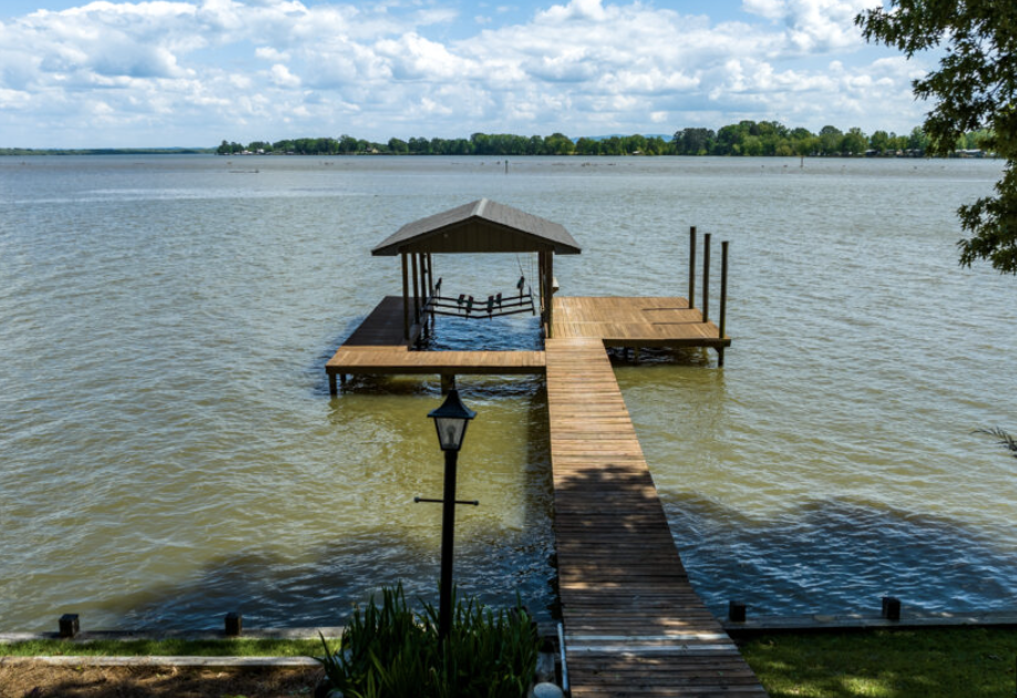 Private gated lake access with dock and picnic area at The Bluffs